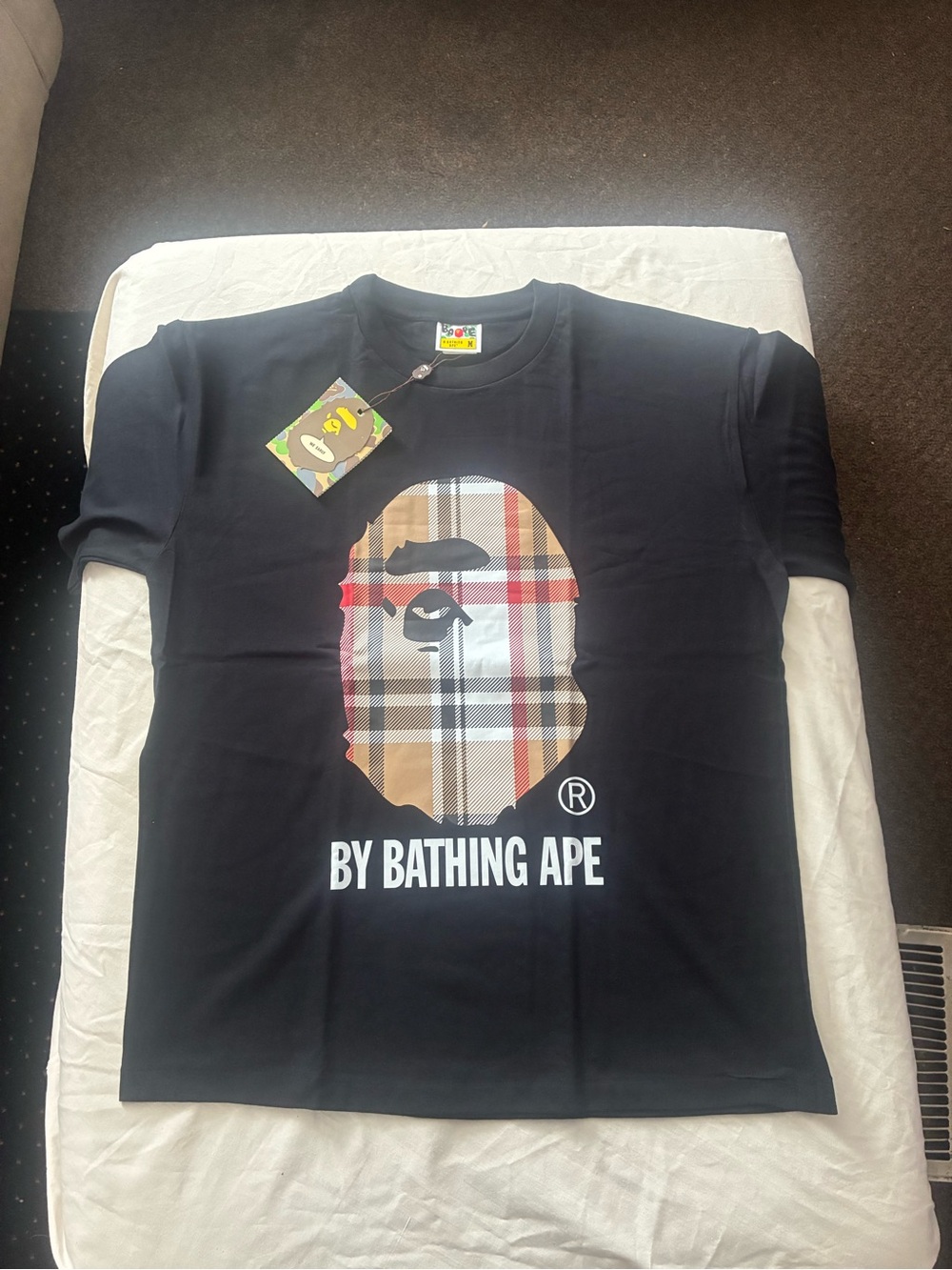 Bape Black Tee with Beige Plaid Ape Head Graphic